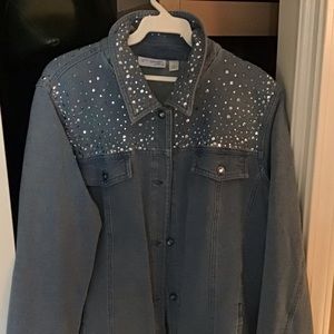 Jean jacket with grommets